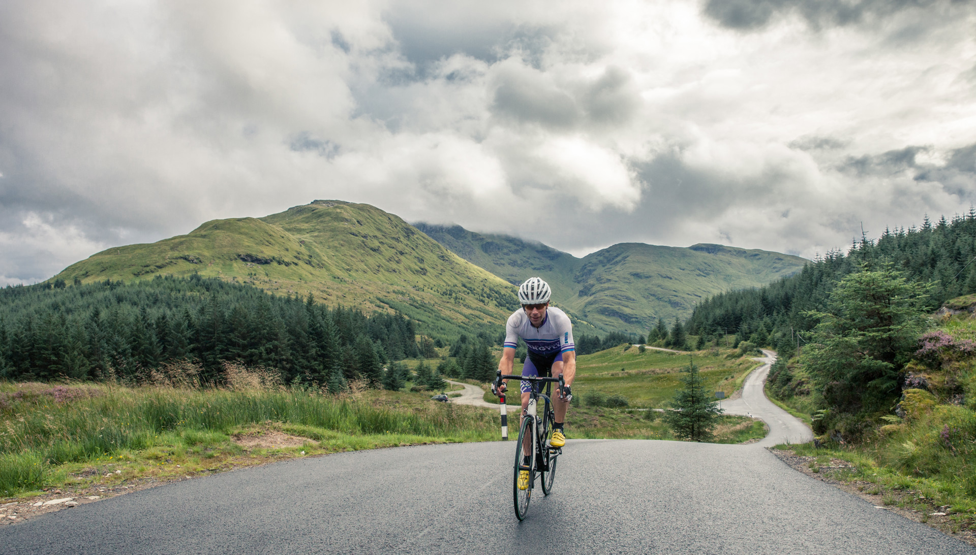 Background image - Road Cycling Argyll Forest Mark Beaumont