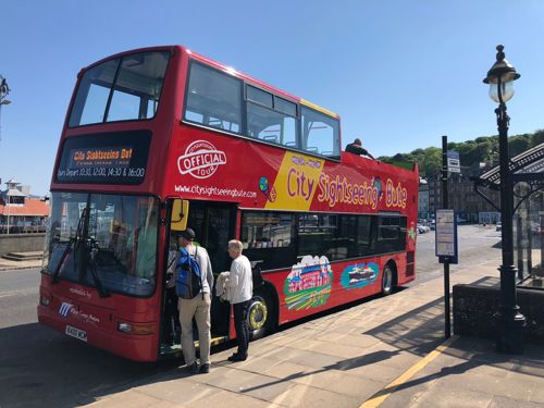 Fancy some sight seeing? Jump on the hop-on-hop-off bus to get around the island.