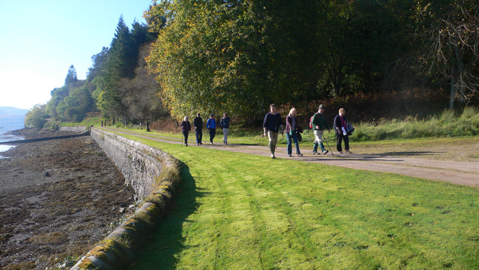 Background image - Cowal Walking Caladh Harbour With Group