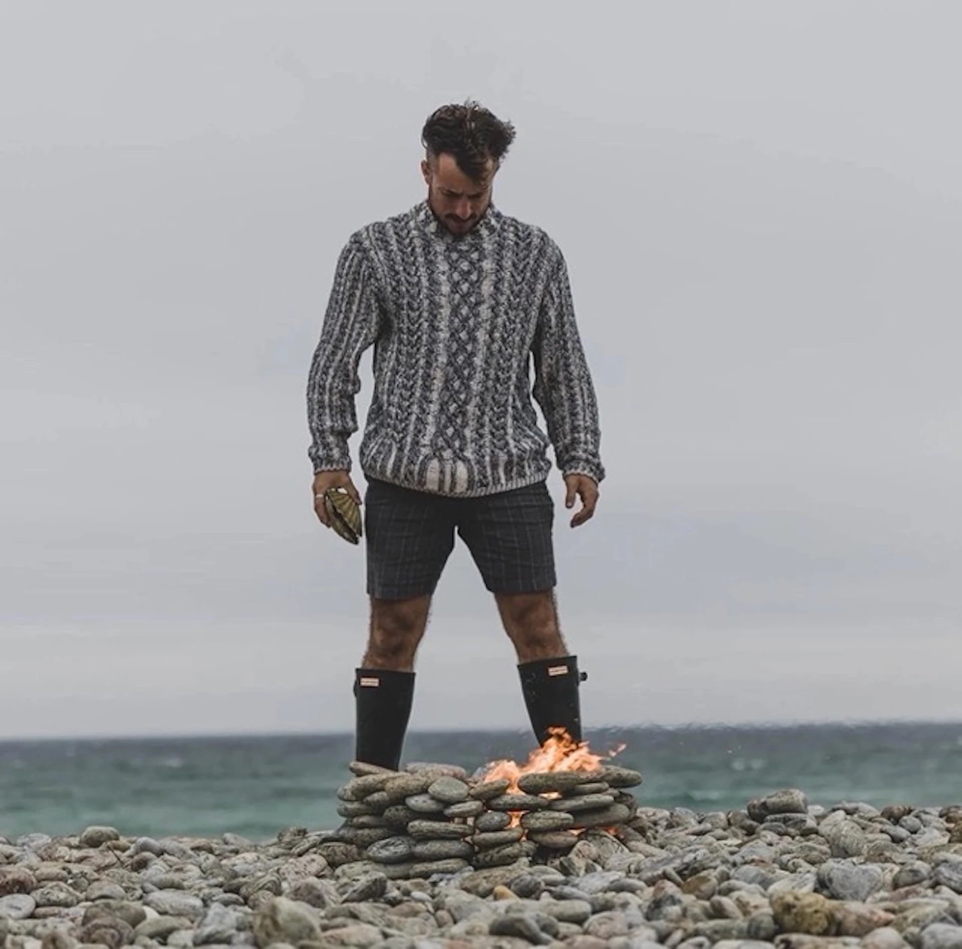 kabn_company_the_wilder_kitchen_supper_club_loch_fyne_scotland_will_standing_over_fire.jpeg