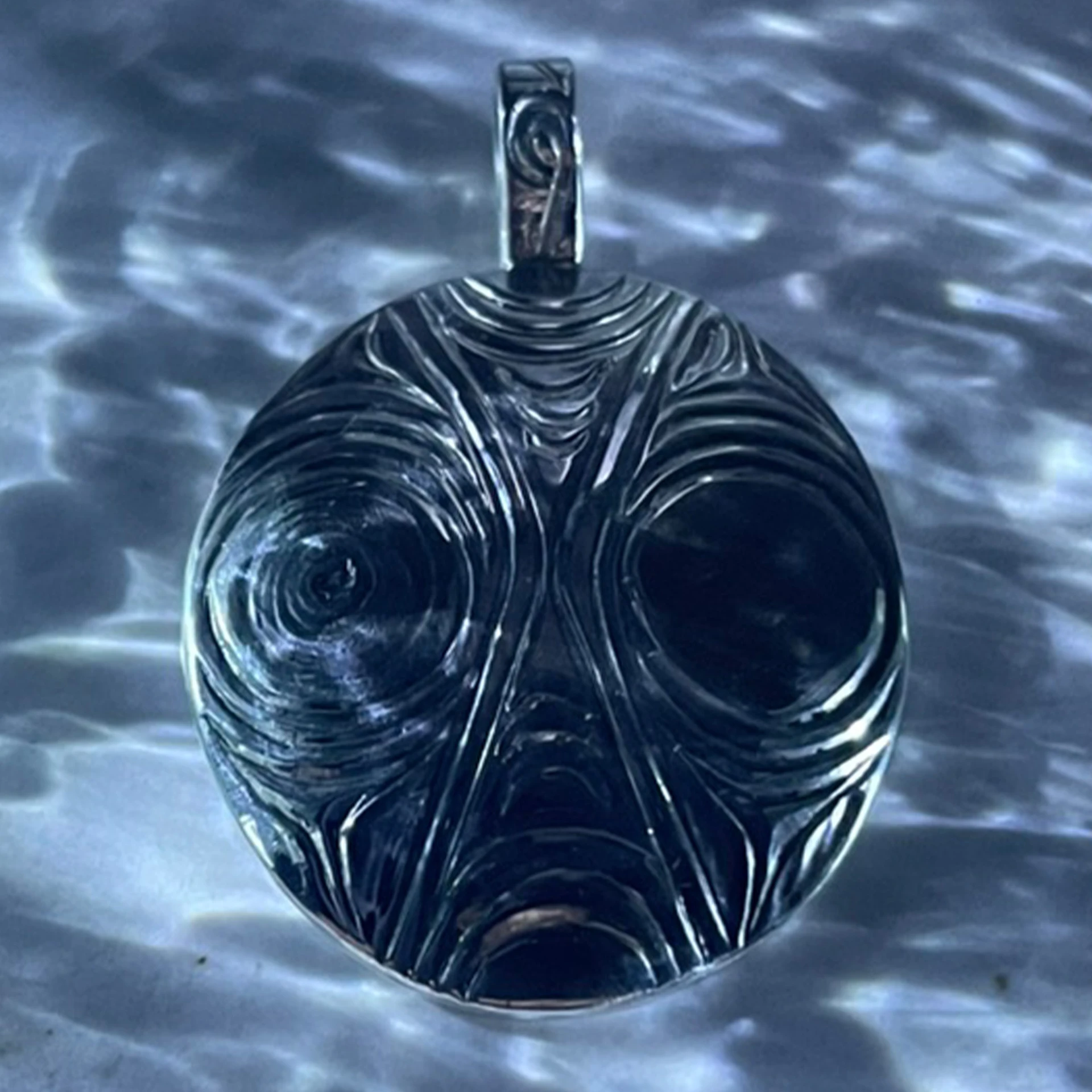 6.edgelands-reel-photo-6-jody_sparrow__goat_horn__2023__sterling_sliver_pendant.jpg