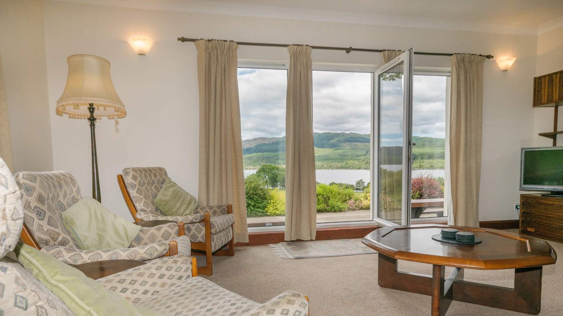 Stable Cottage Lounge Looking Out To Loch Awe